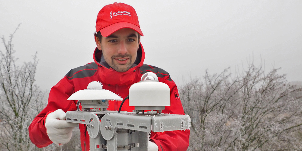 A typical problem in freezing conditions: ice accumulation on the pyranometer dome surface reduces data availability. At the front, a new pyranometer design with recirculating ventilation.