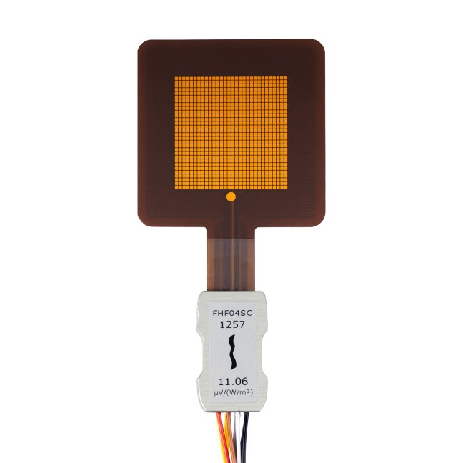 Self-calibrating foil heat flux sensor with thermal spreaders and heater